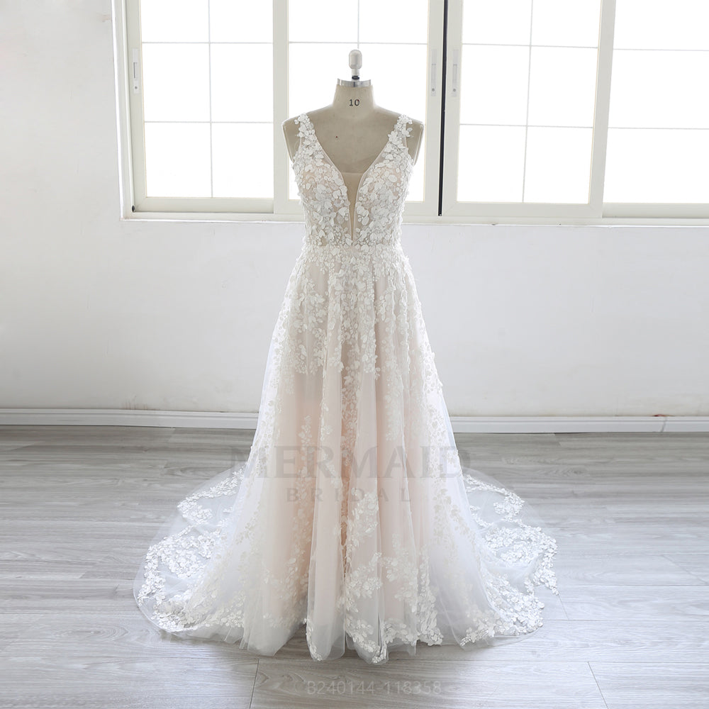 Luxury Bridal Gown with Deep V Neckline and Flowing Lace Wedding Dress