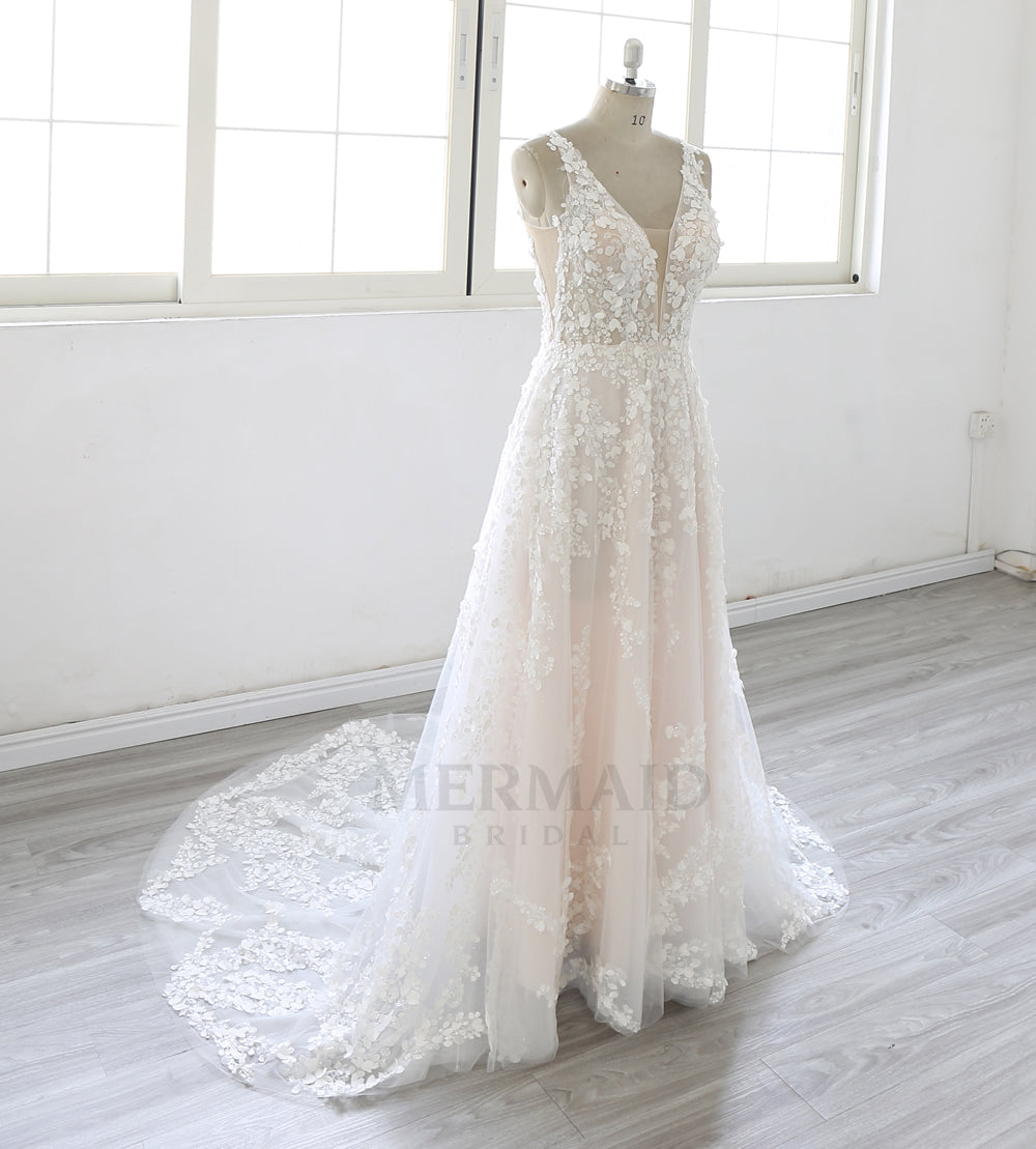 Luxury Bridal Gown with Deep V Neckline and Flowing Lace Wedding Dress