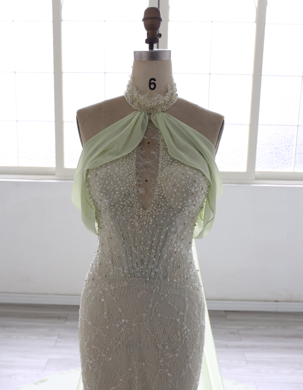 Elegant Beaded Mermaid Evening Dress  with Halter Neckline & Flowing Draped Train