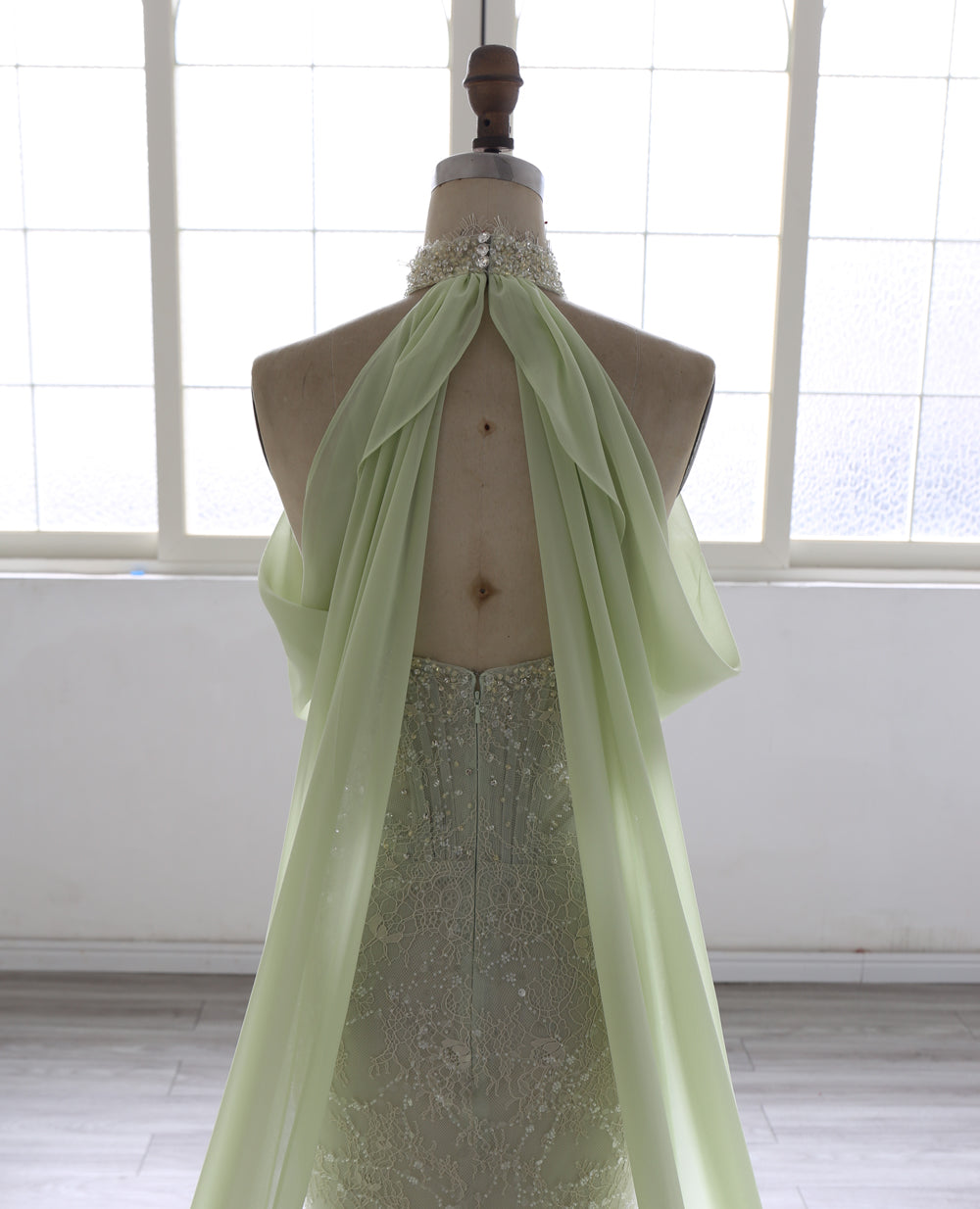 Elegant Beaded Mermaid Evening Dress  with Halter Neckline & Flowing Draped Train